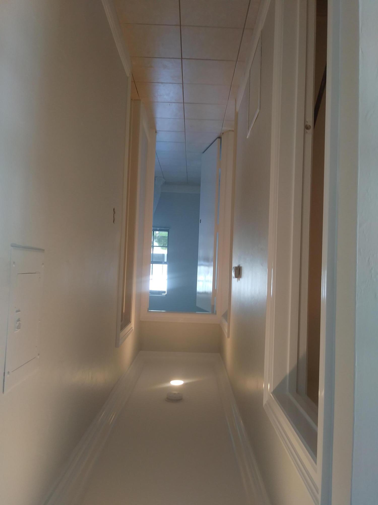 299 Southwest 7th Street, Unit 1090 Boca Raton, FL 33432 - Photo 10 of 23 BOCAEASTPHOTOSHALLWAY