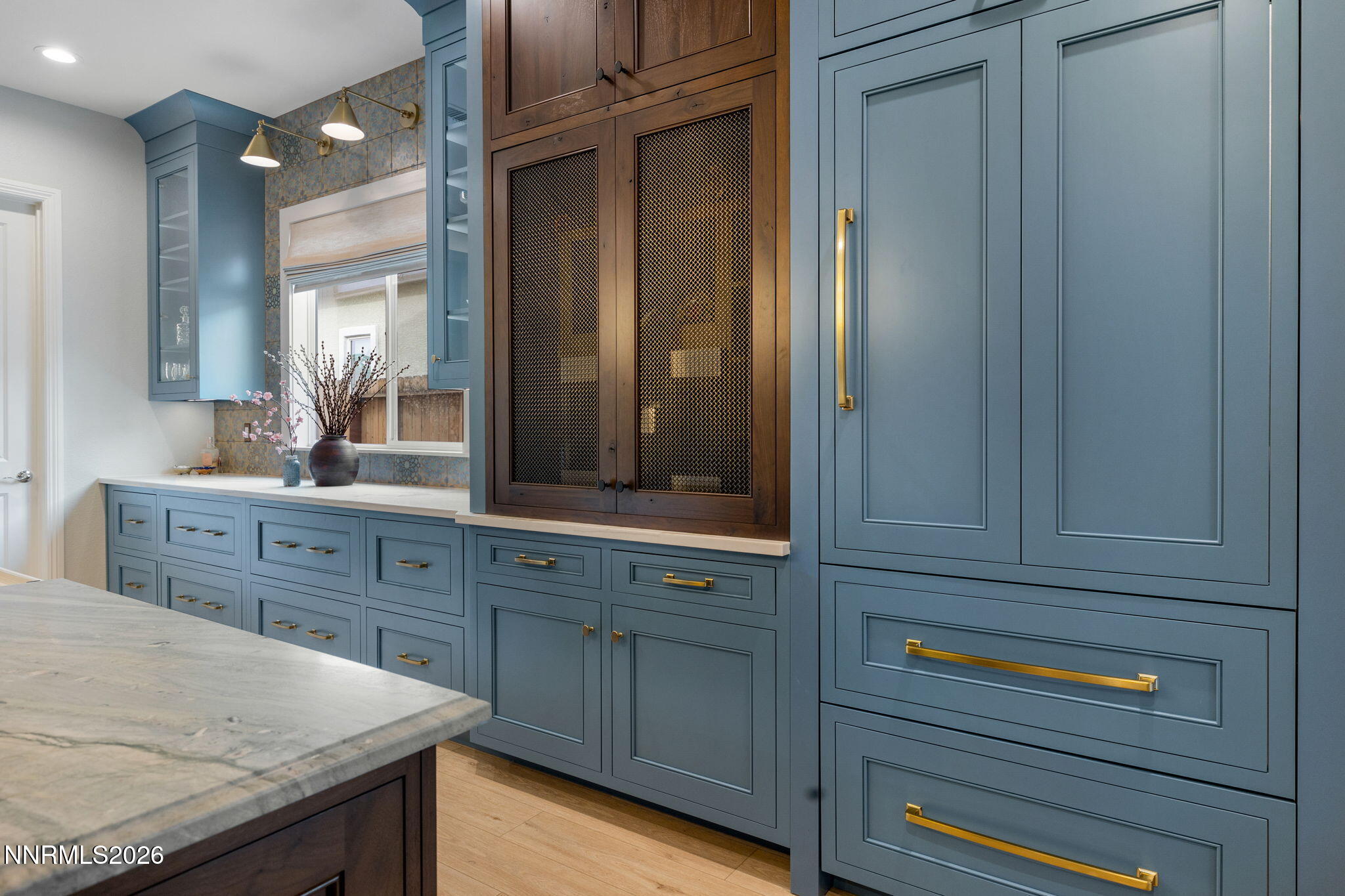 9505 Copper Sky Drive Reno, NV 89521 - Photo 12 of 50 a bathroom with a granite countertop sink and a mirror