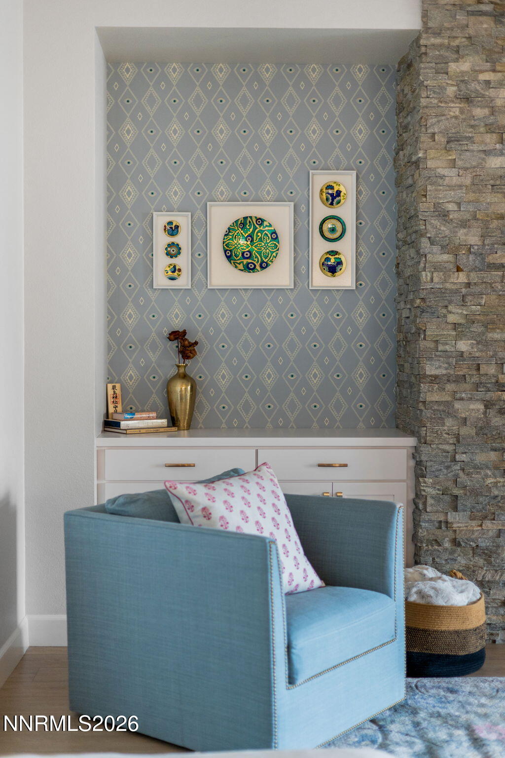 9505 Copper Sky Drive Reno, NV 89521 - Photo 18 of 50 a living room with a couch and a potted plant