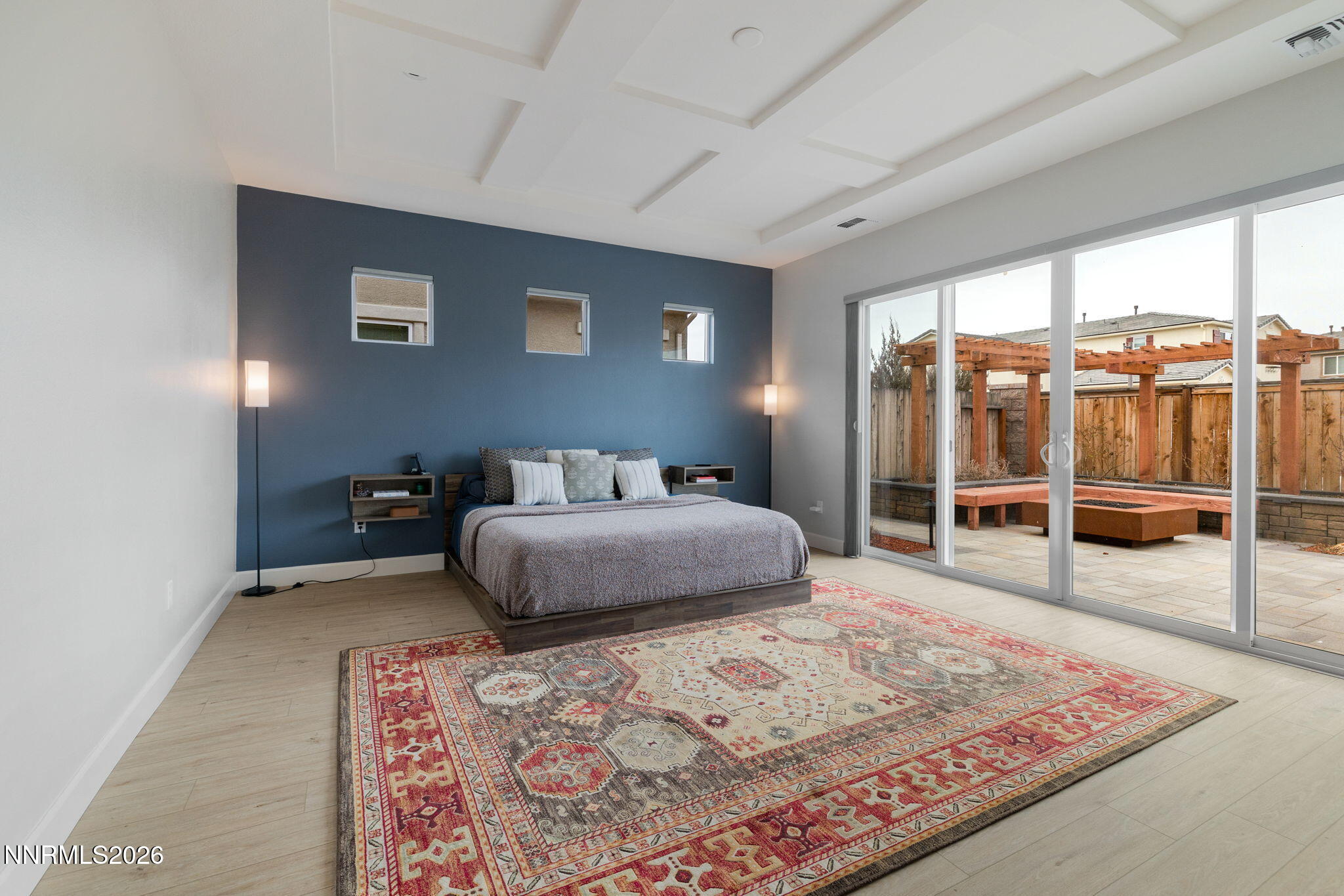 9505 Copper Sky Drive Reno, NV 89521 - Photo 21 of 50 a bedroom with a large bed and a window