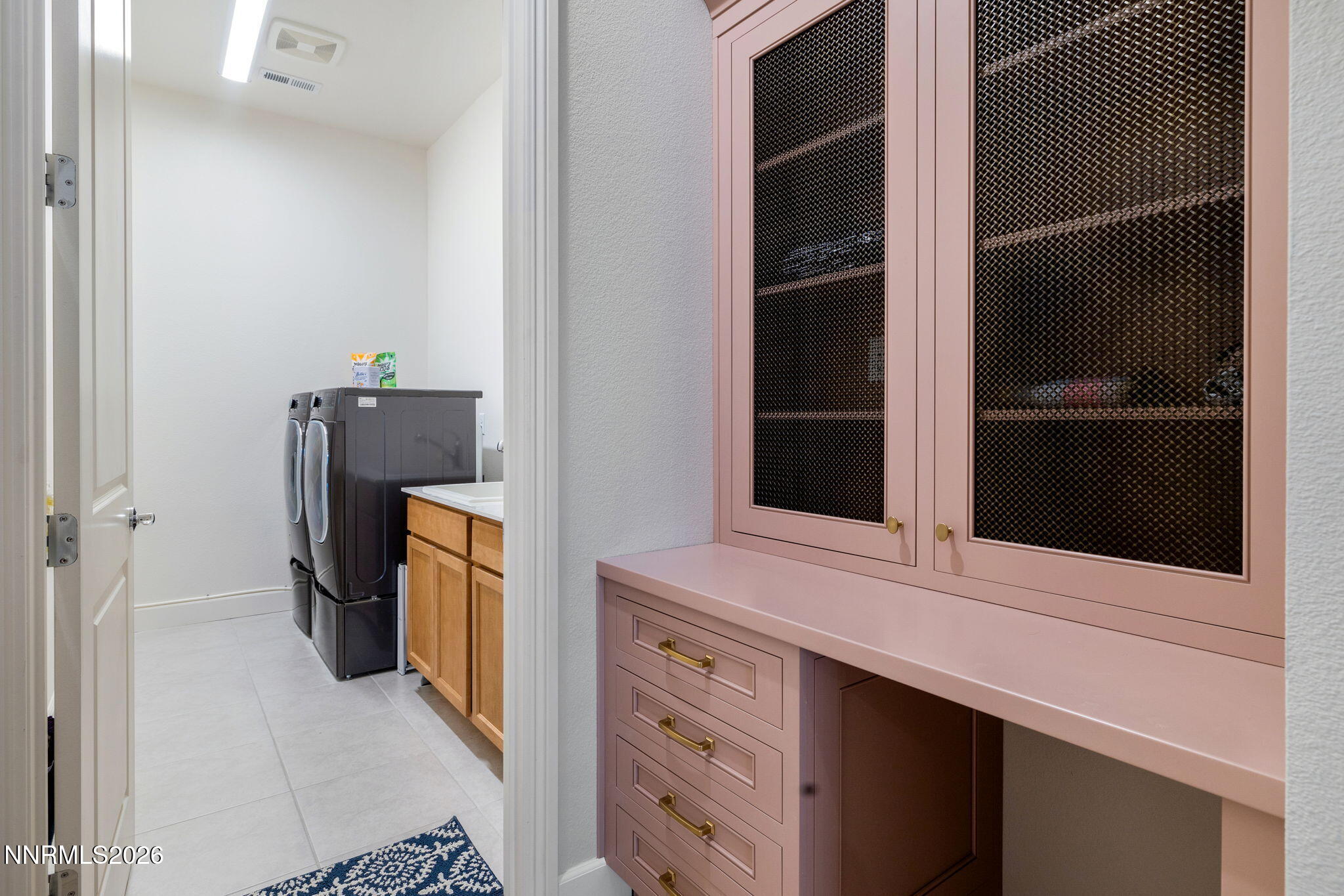9505 Copper Sky Drive Reno, NV 89521 - Photo 24 of 50 a kitchen with a refrigerator and a stove