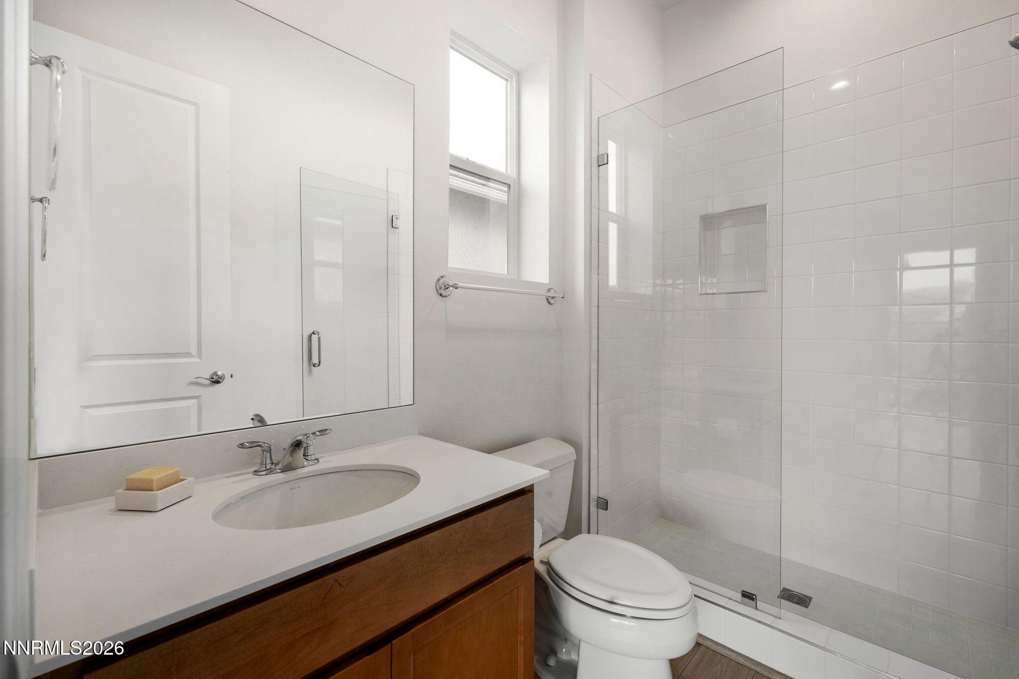 9505 Copper Sky Drive Reno, NV 89521 - Photo 26 of 50 a bathroom with a sink toilet and shower