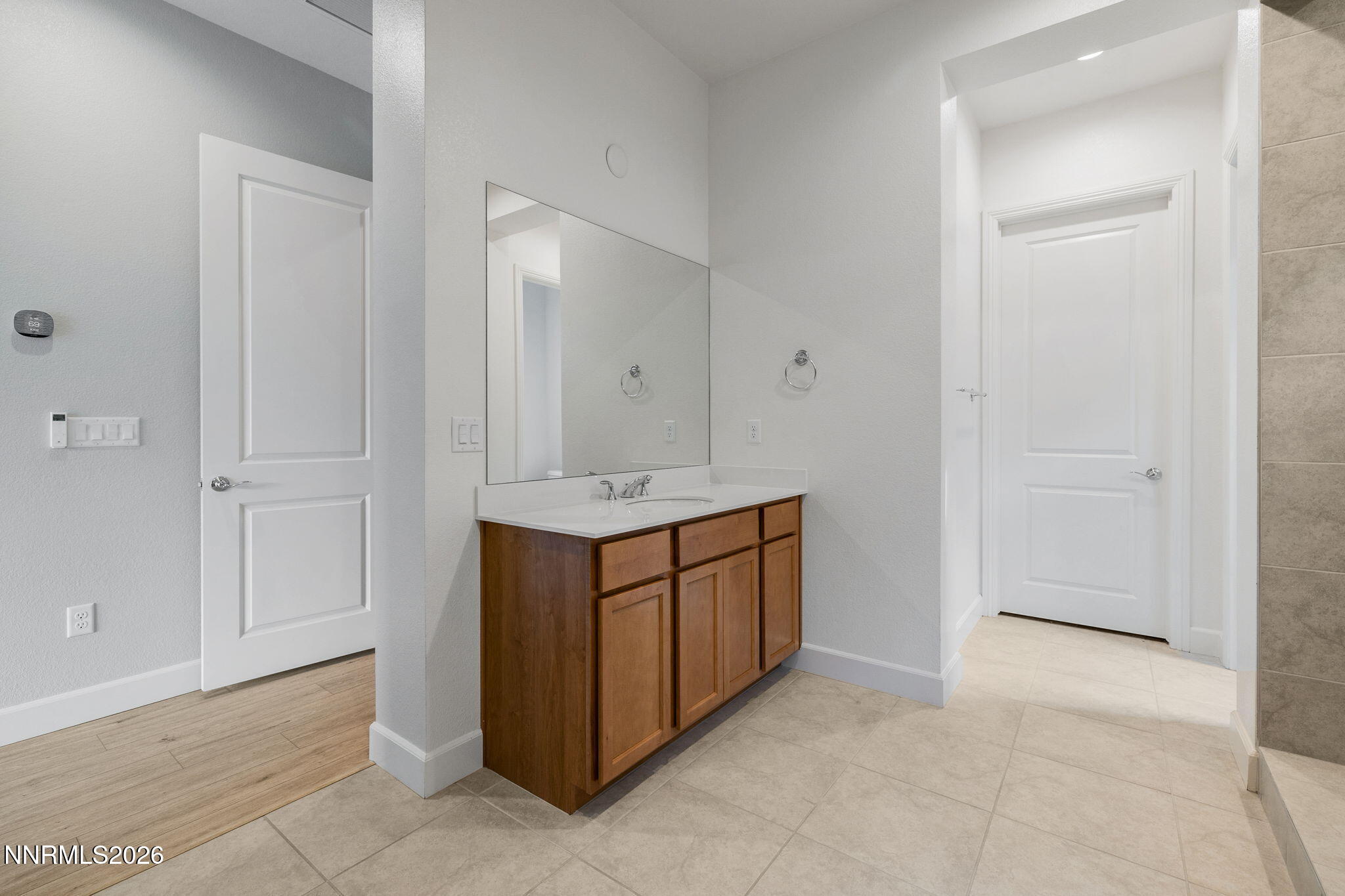 9505 Copper Sky Drive Reno, NV 89521 - Photo 28 of 50 a bathroom with a sink and a mirror
