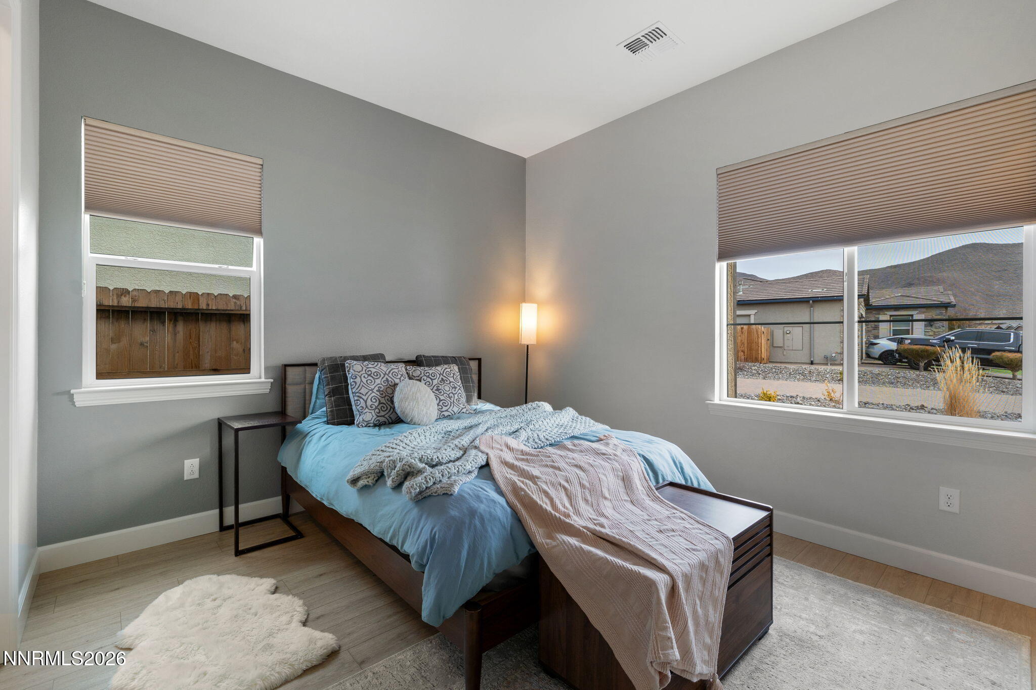 9505 Copper Sky Drive Reno, NV 89521 - Photo 31 of 50 a bedroom with a bed and window