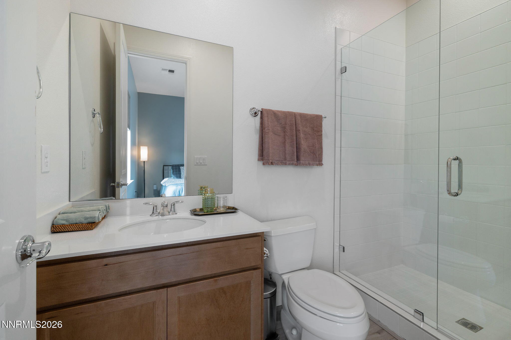 9505 Copper Sky Drive Reno, NV 89521 - Photo 32 of 50 a bathroom with a sink a toilet and shower