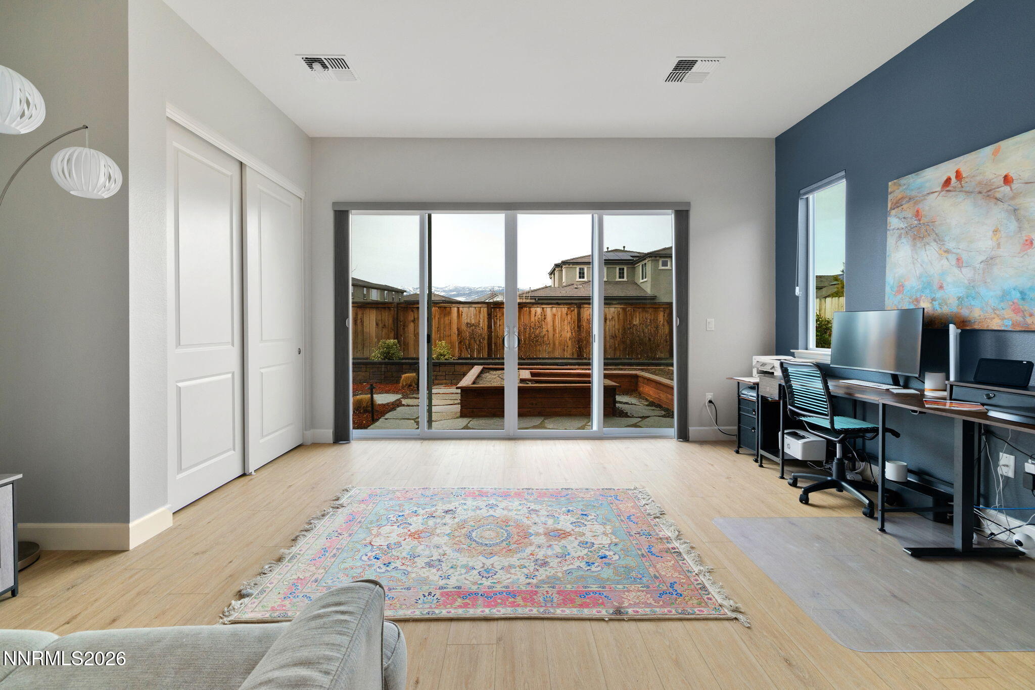 9505 Copper Sky Drive Reno, NV 89521 - Photo 34 of 50 a living room with furniture window and a flat screen tv
