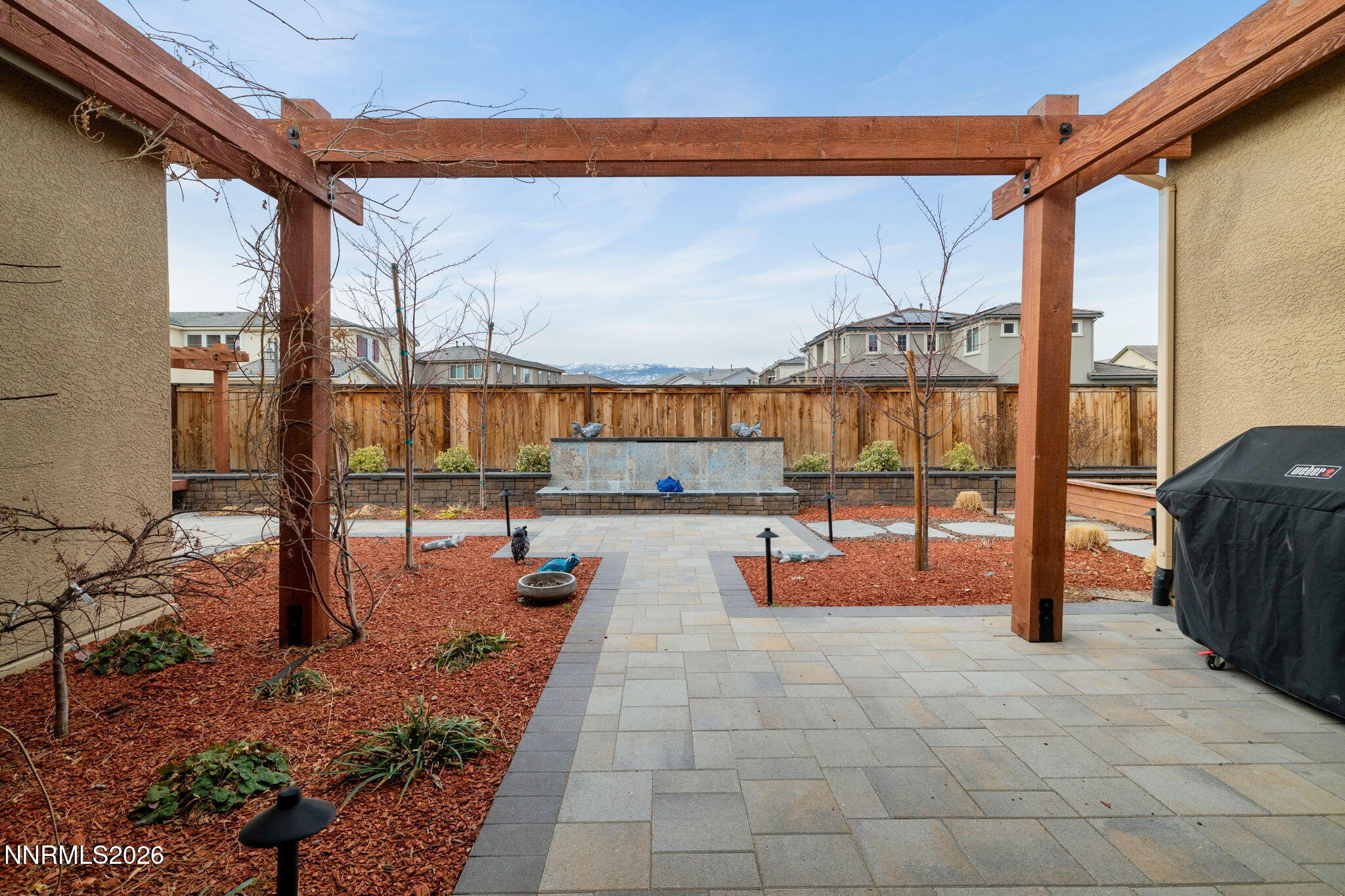 9505 Copper Sky Drive Reno, NV 89521 - Photo 38 of 50 a view of a swimming pool with a lounge chairs