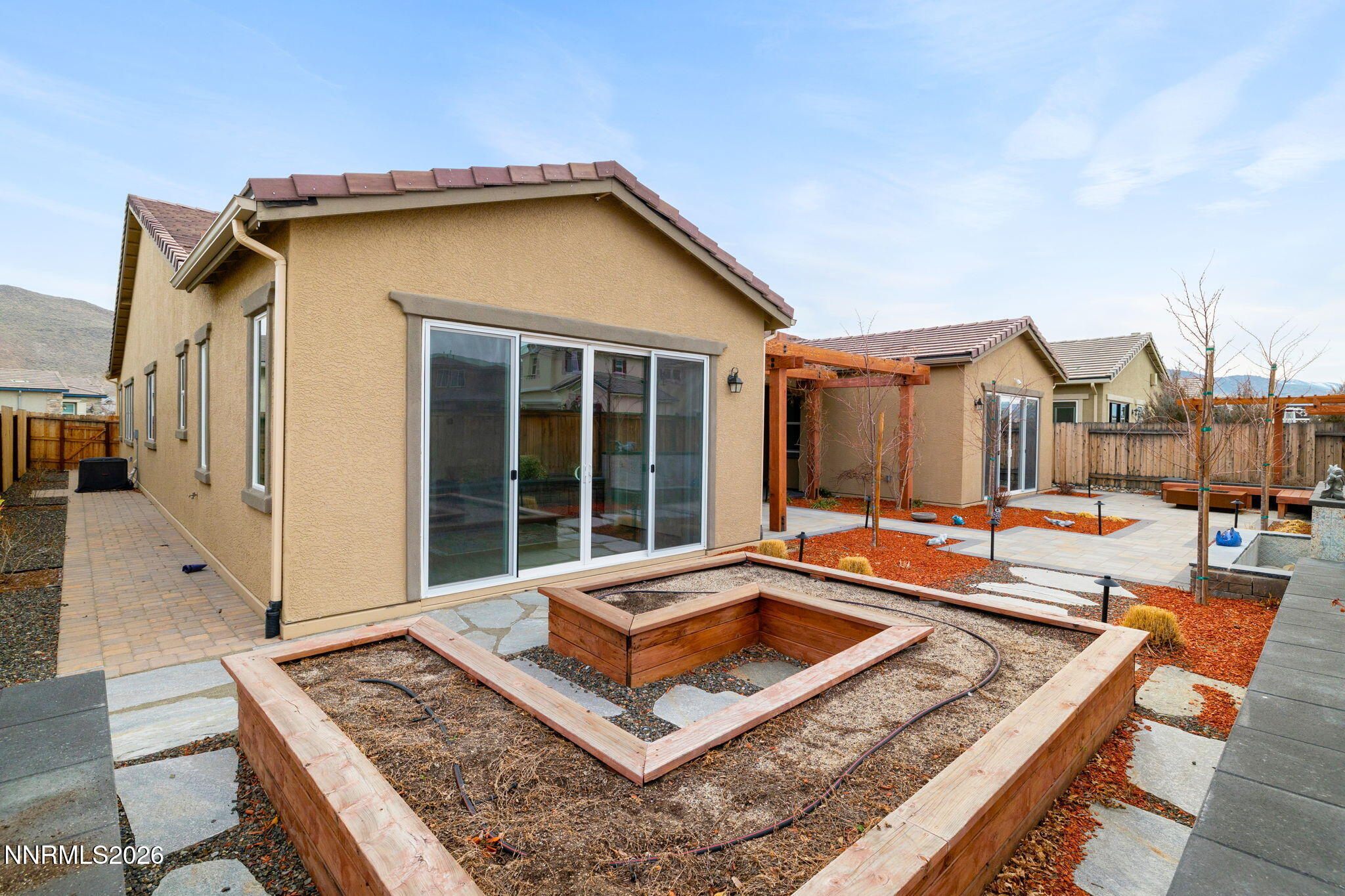 9505 Copper Sky Drive Reno, NV 89521 - Photo 41 of 50 a view of a house with pool and sitting area