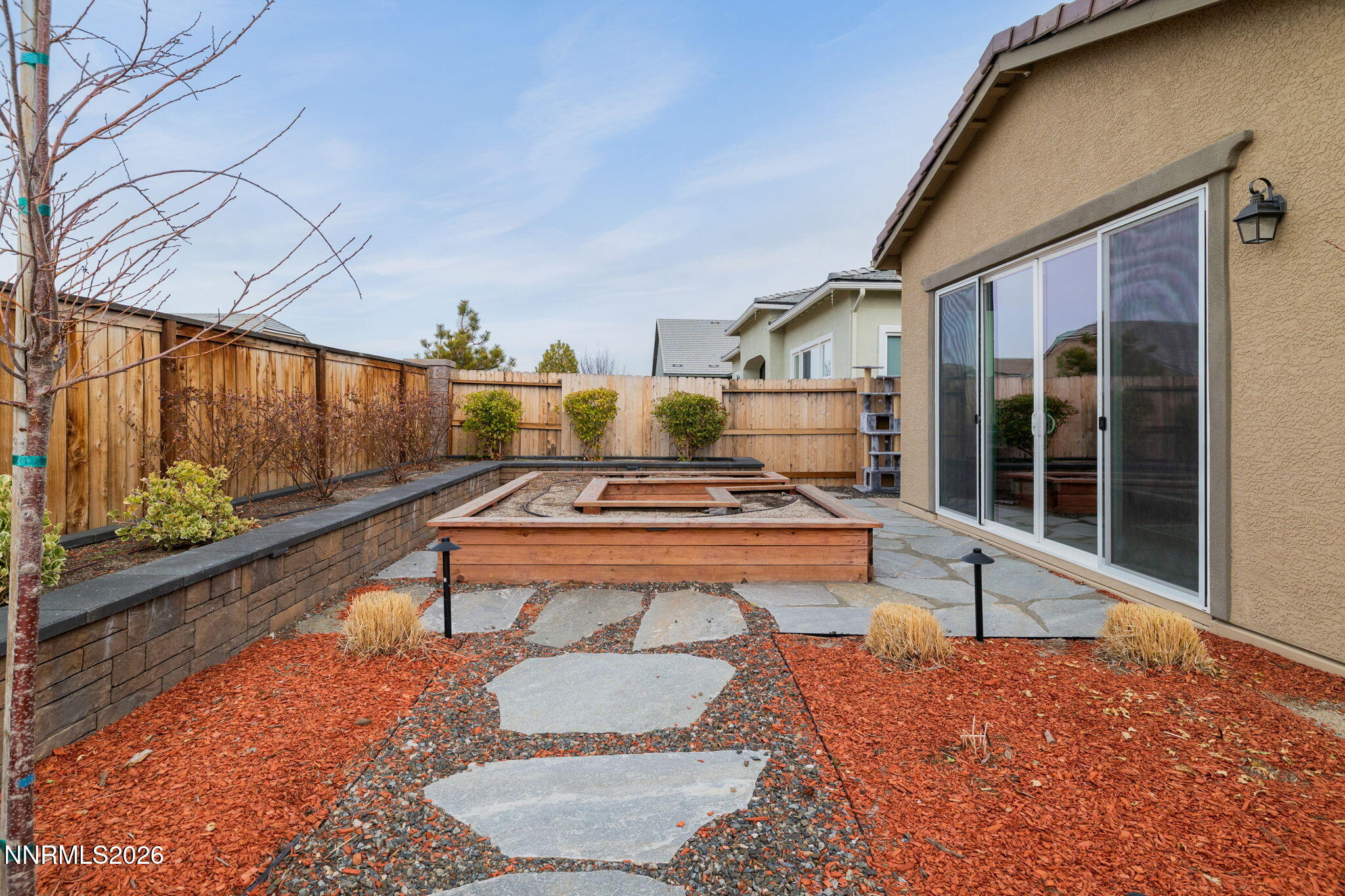 9505 Copper Sky Drive Reno, NV 89521 - Photo 42 of 50 a view of a backyard with sitting area