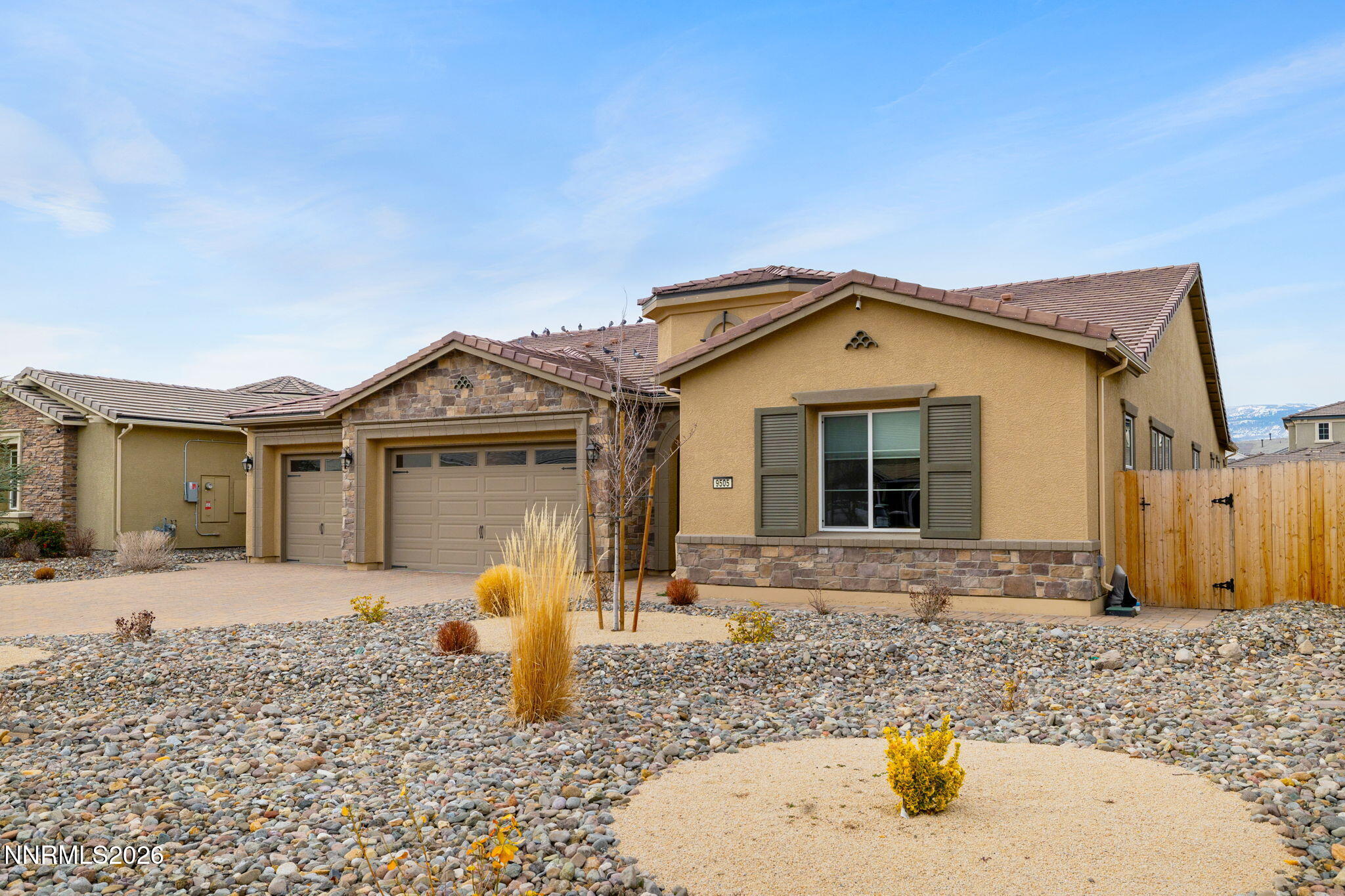 9505 Copper Sky Drive Reno, NV 89521 - Photo 44 of 50 a front view of a house with a yard