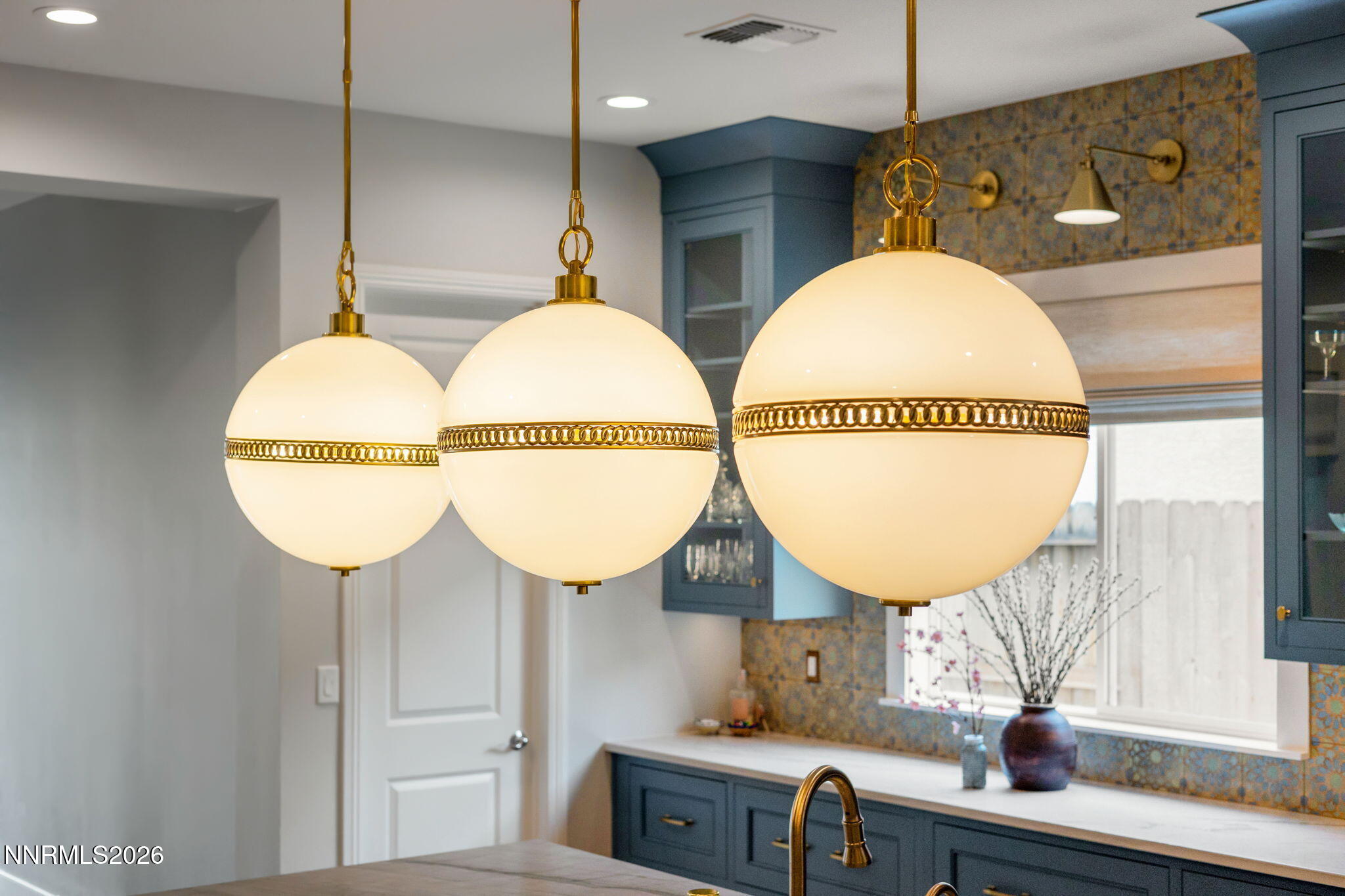 9505 Copper Sky Drive Reno, NV 89521 - Photo 49 of 50 a bathroom with a sink mirror and window