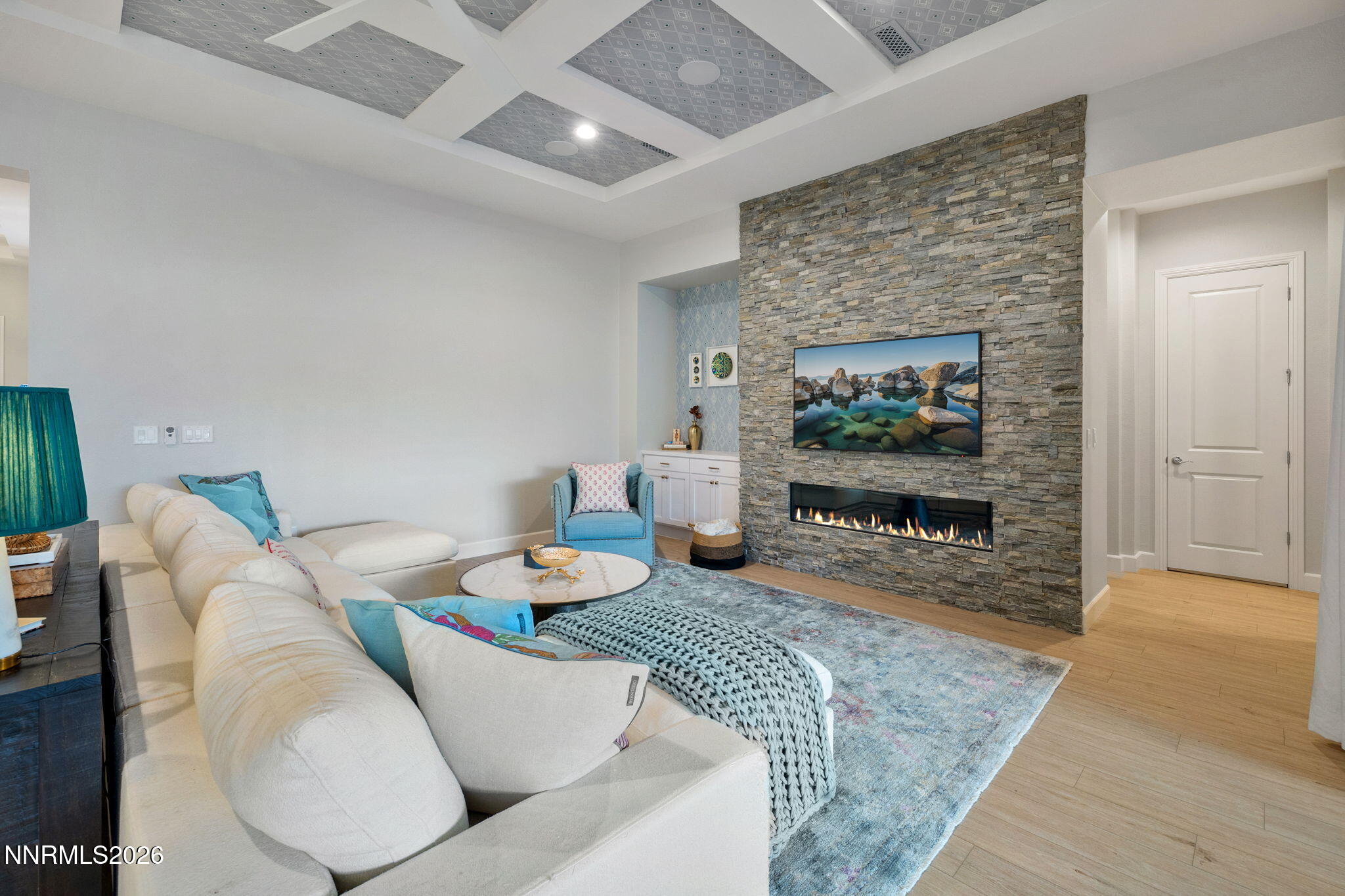 9505 Copper Sky Drive Reno, NV 89521 - Photo 8 of 50 a living room with furniture and a flat screen tv