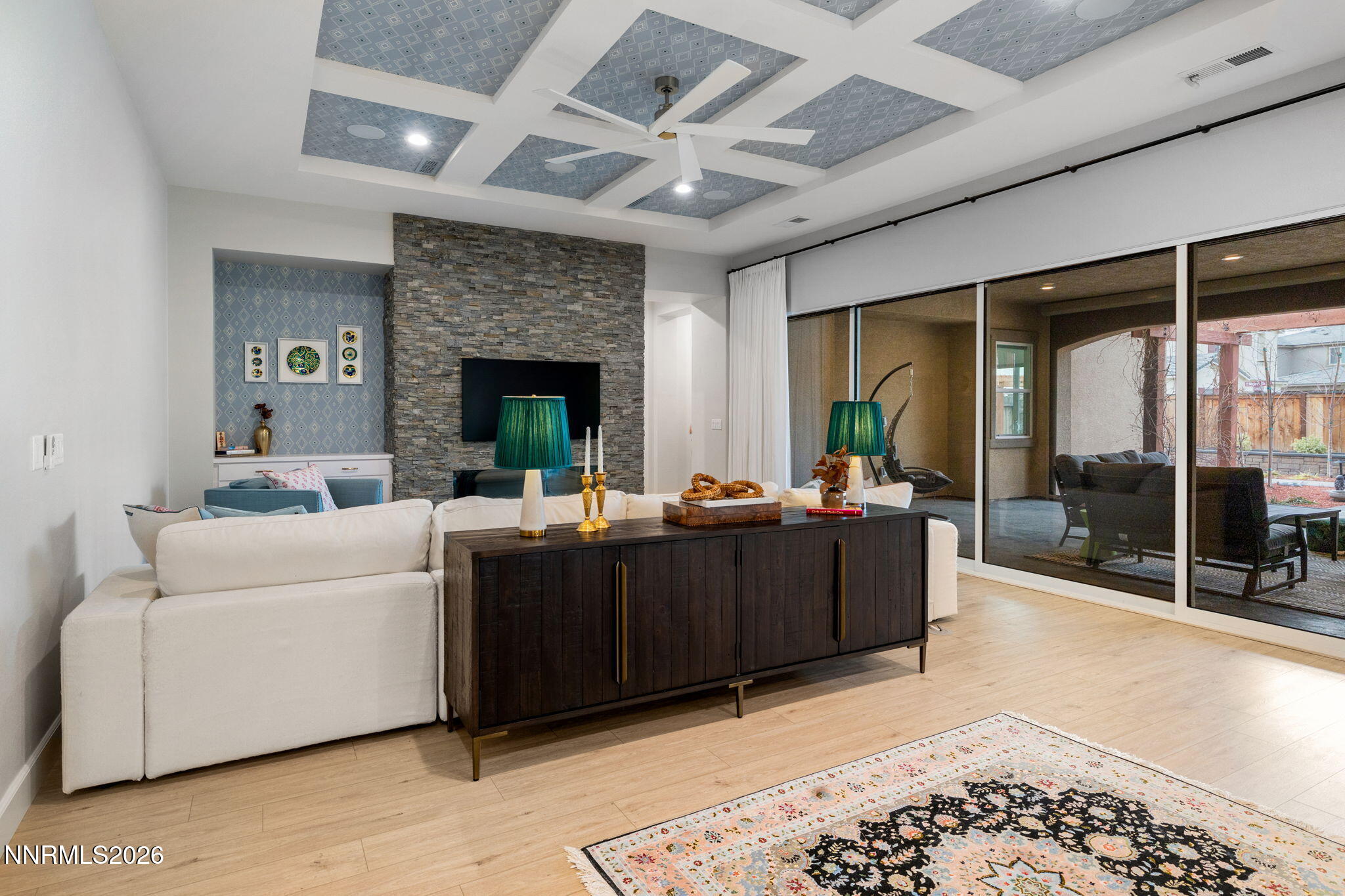 9505 Copper Sky Drive Reno, NV 89521 - Photo 9 of 50 a living room with furniture and a fireplace