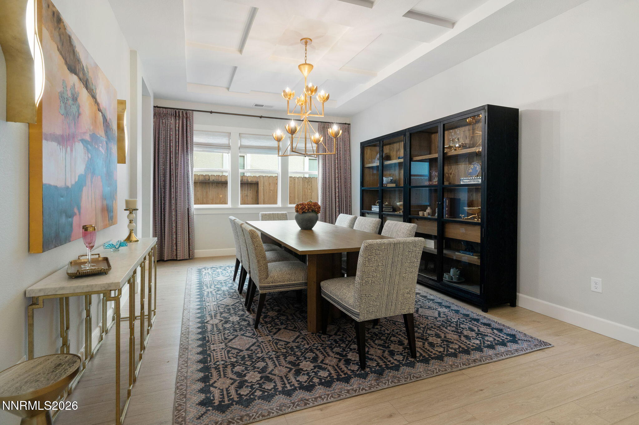 9505 Copper Sky Drive Reno, NV 89521 - Photo 10 of 50 a dining room with furniture a rug and wooden floor