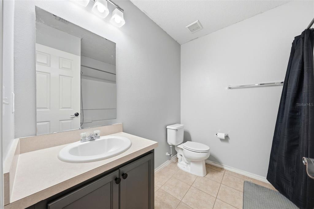 1765 Strathmore Circle Mount Dora, FL 32757 - Photo 16 of 51 a bathroom with a sink toilet and a mirror