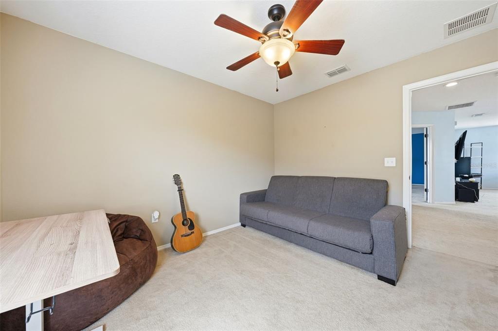 1765 Strathmore Circle Mount Dora, FL 32757 - Photo 21 of 51 a living room with furniture