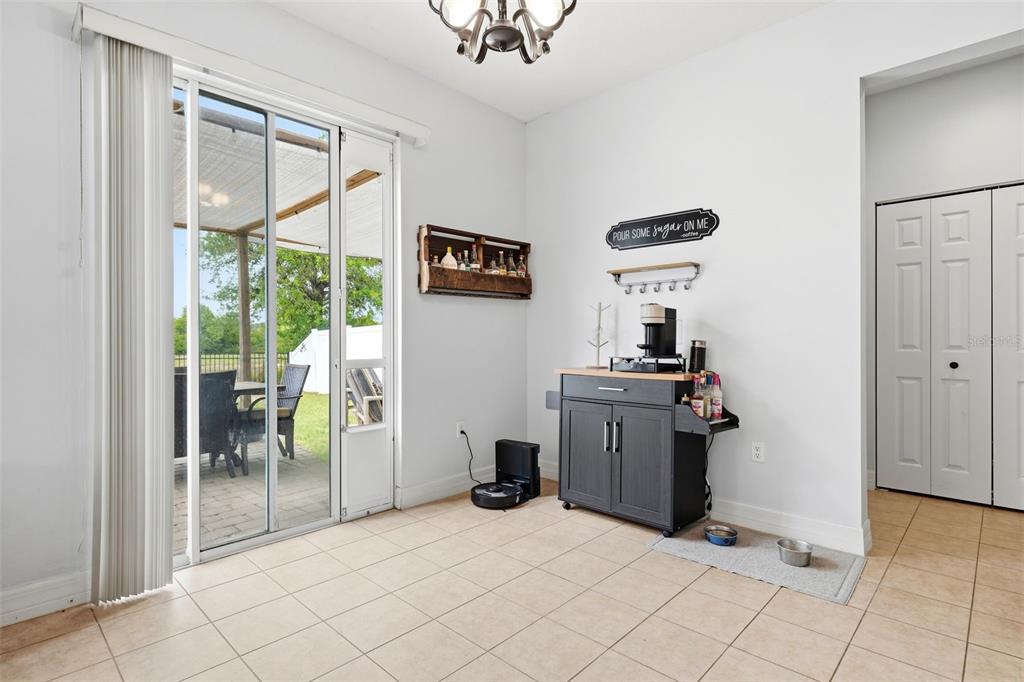 1765 Strathmore Circle Mount Dora, FL 32757 - Photo 31 of 51 a room with closet and a chandelier