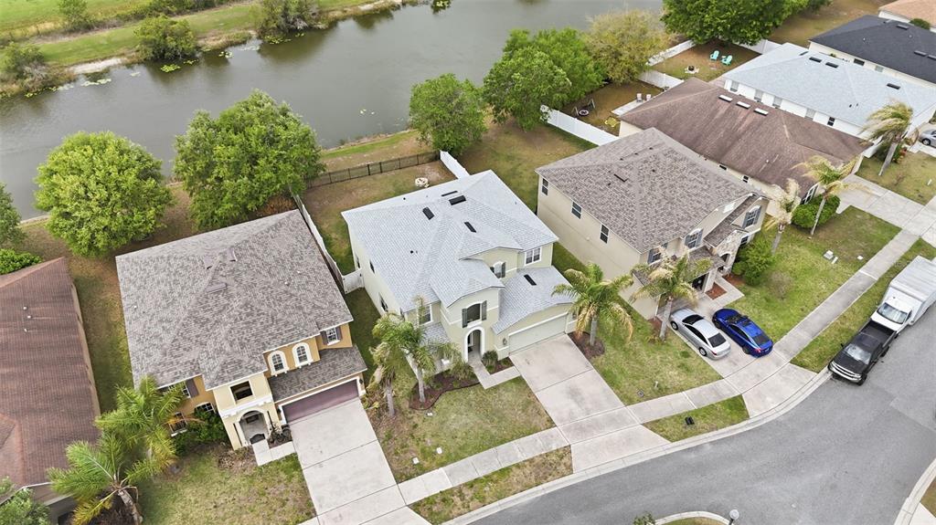 1765 Strathmore Circle Mount Dora, FL 32757 - Photo 45 of 51 an aerial view of residential house with outdoor space and lake view