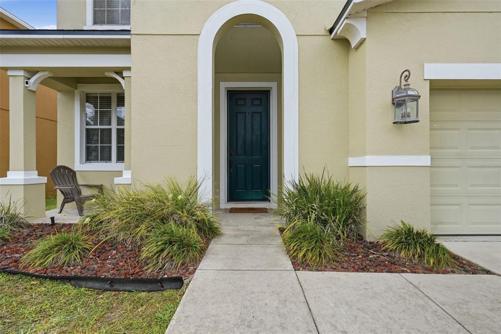 1765 Strathmore Circle Mount Dora, FL 32757 - Photo 5 of 51 a front view of a house