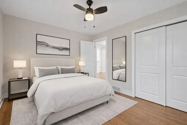 a front view of house with a garden