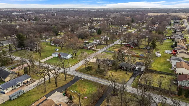 a view of a building with a yard