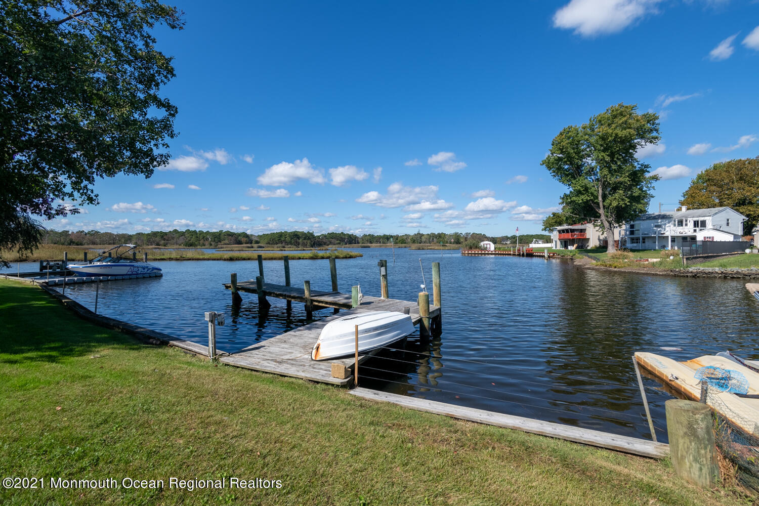 1521 Little Hill Road Point Pleasant, NJ 08742 - Photo 2 of 28 a view of a lake with houses with outdoor space