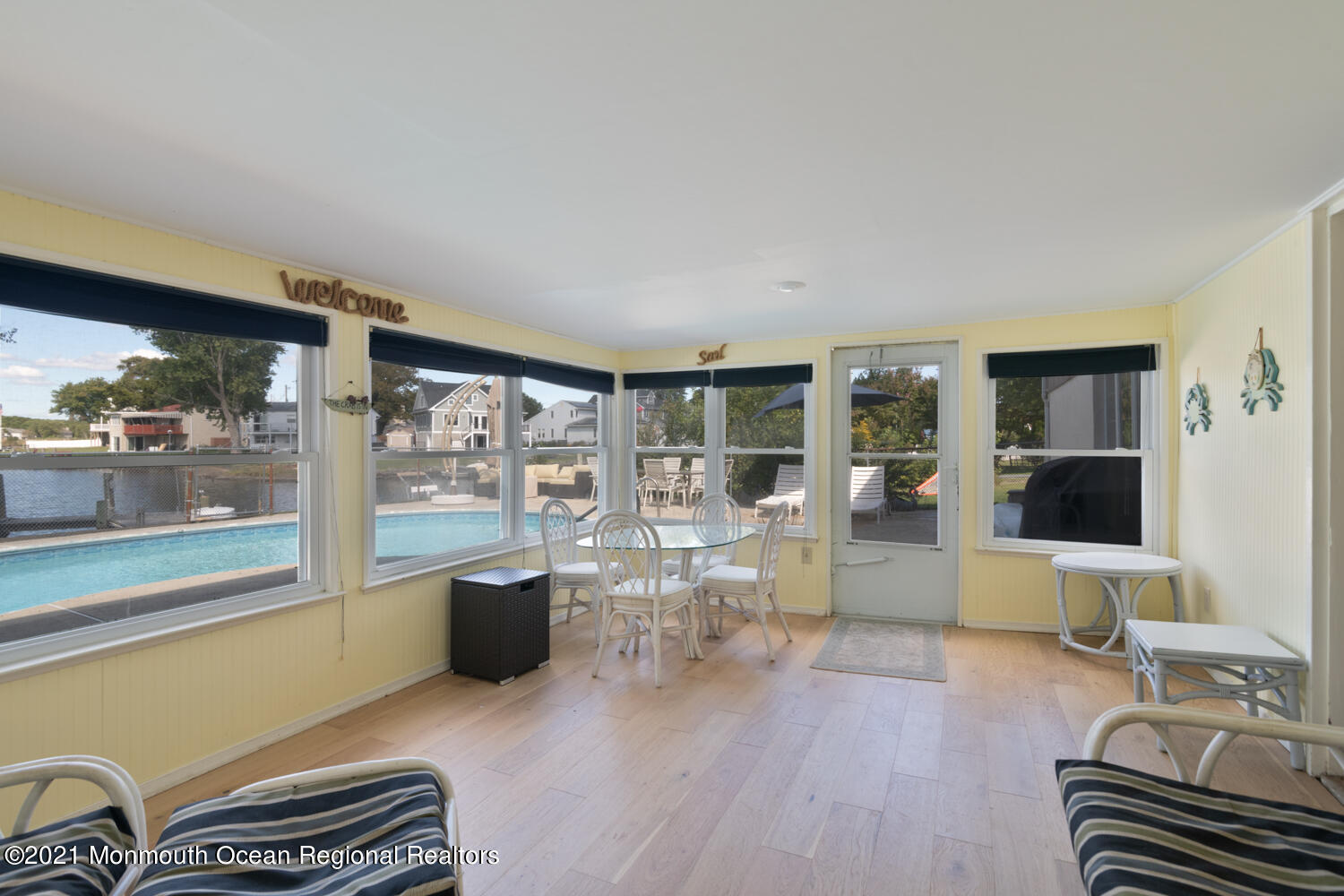 1521 Little Hill Road Point Pleasant, NJ 08742 - Photo 3 of 28 a living room with furniture and a floor to ceiling window