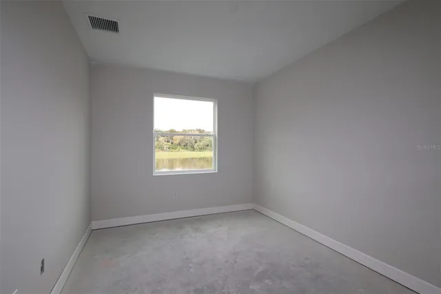an empty room with a window
