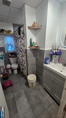 a bathroom with a toilet and a sink