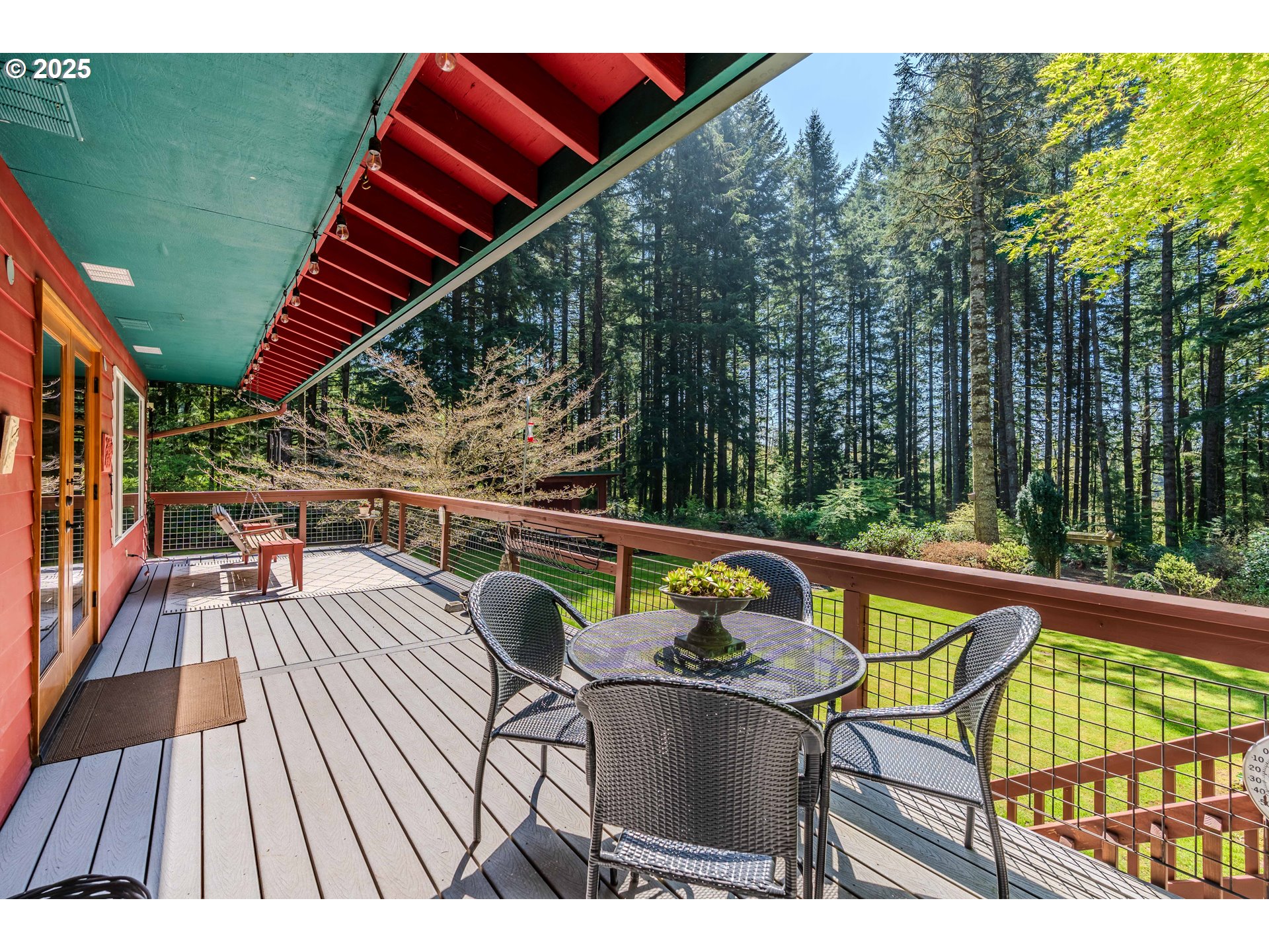 41920 Southeast Gordon Creek Road Corbett, OR 97019 - Photo 11 of 48 a view of balcony with wooden floor and outdoor seating