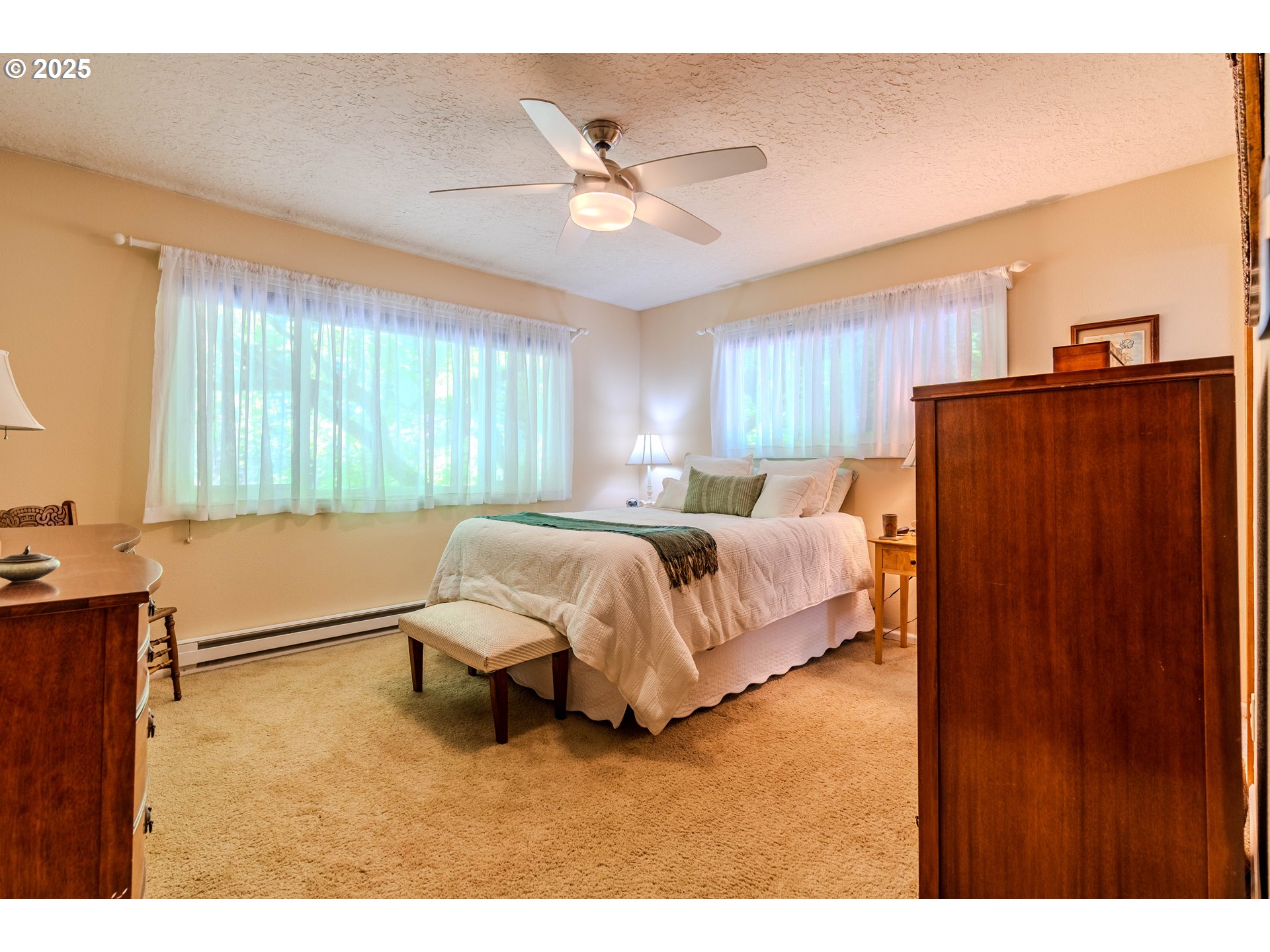 41920 Southeast Gordon Creek Road Corbett, OR 97019 - Photo 13 of 48 a bed room with a bed and a window