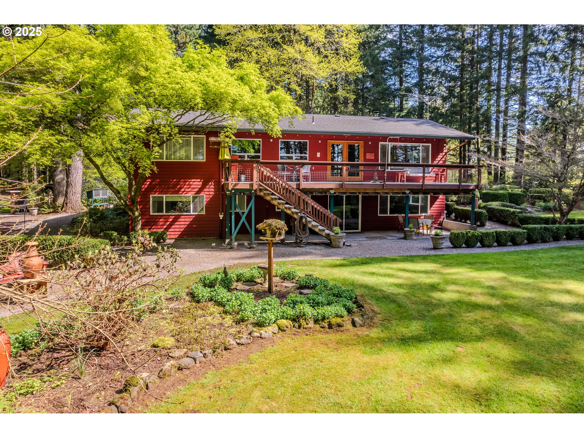 41920 Southeast Gordon Creek Road Corbett, OR 97019 - Photo 2 of 48 a view of swimming pool with deck and a garden