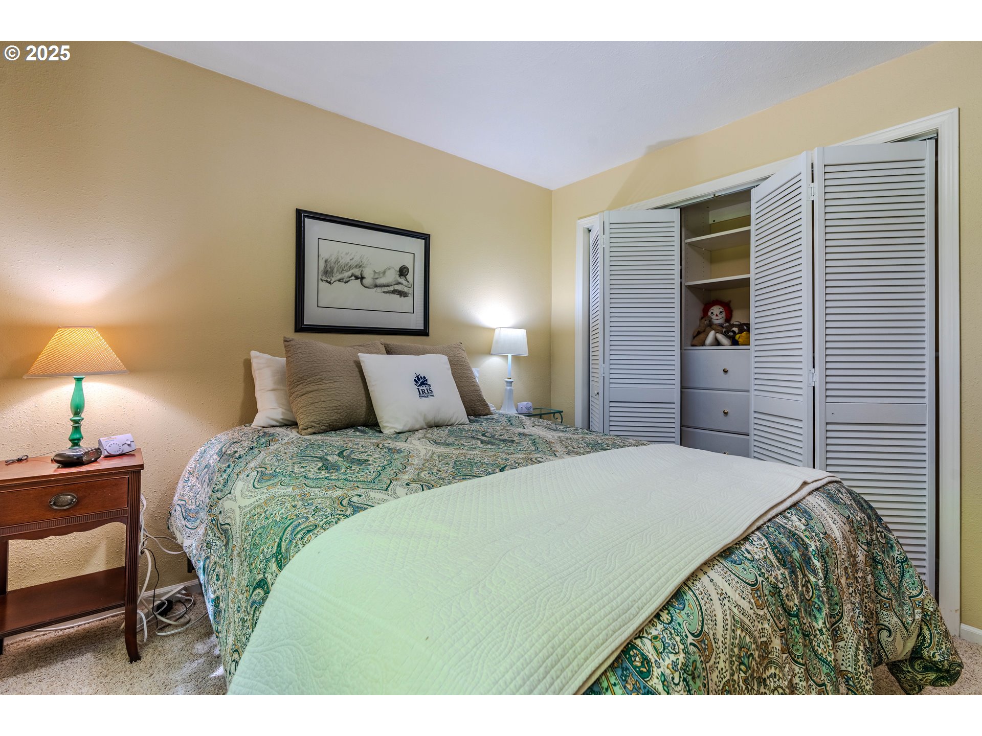 41920 Southeast Gordon Creek Road Corbett, OR 97019 - Photo 27 of 48 a bedroom with a bed and a lamp on dresser