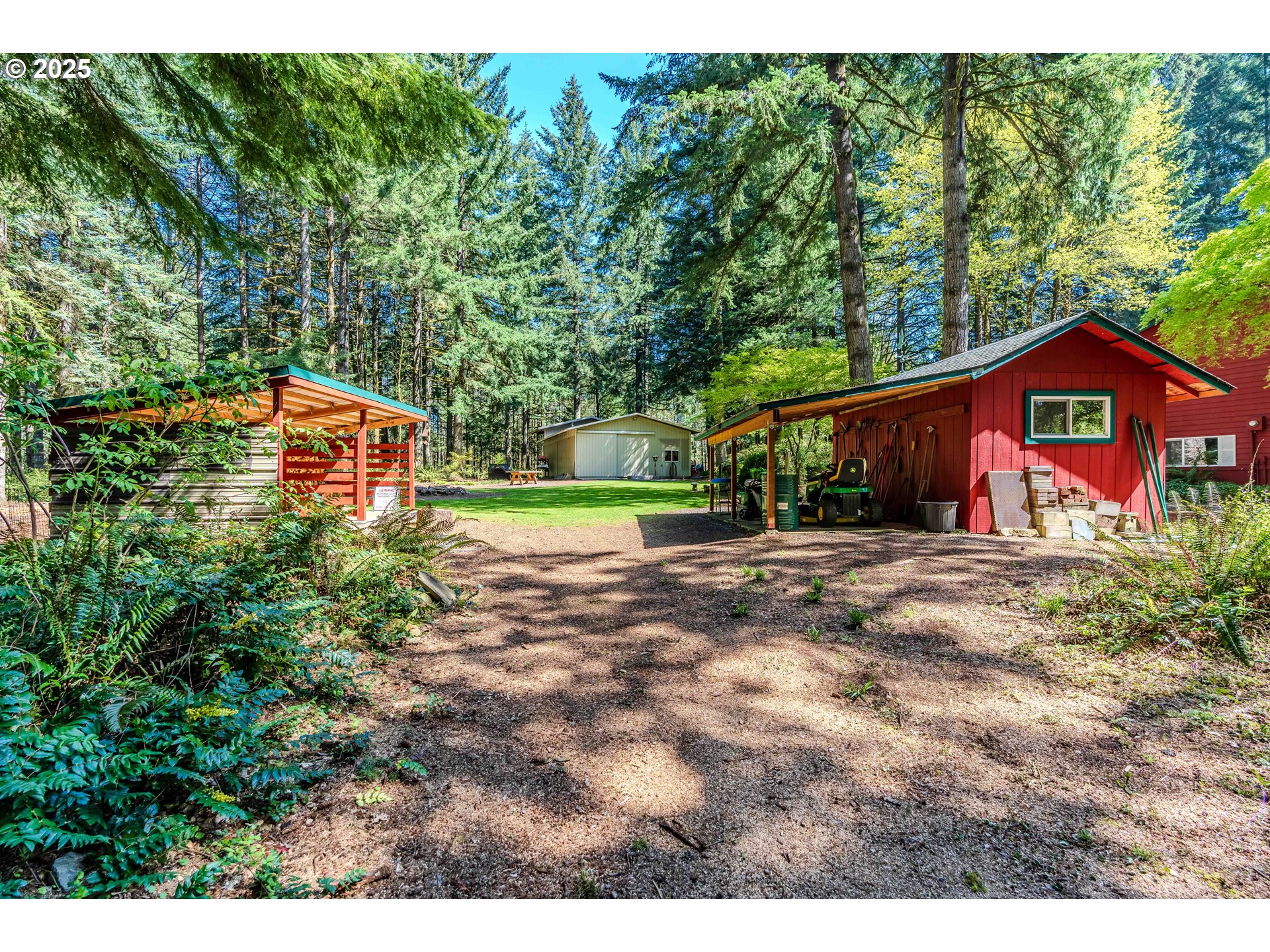 41920 Southeast Gordon Creek Road Corbett, OR 97019 - Photo 43 of 48 a view of a house with a yard