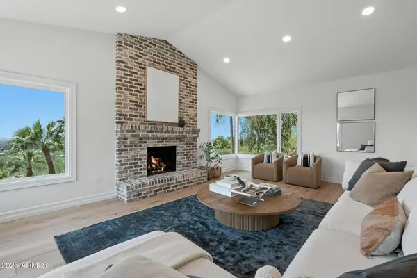 a bedroom with a large bed and a couch