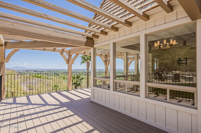 a view of a porch with a garden