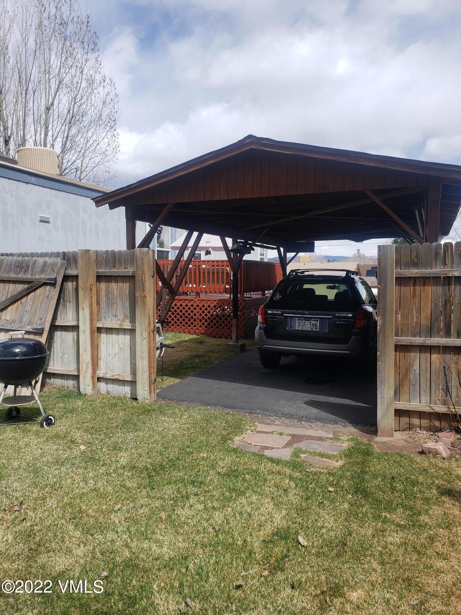 742 2nd Street Gypsum, CO 81637 - Photo 16 of 17 a view of garage with a car parked