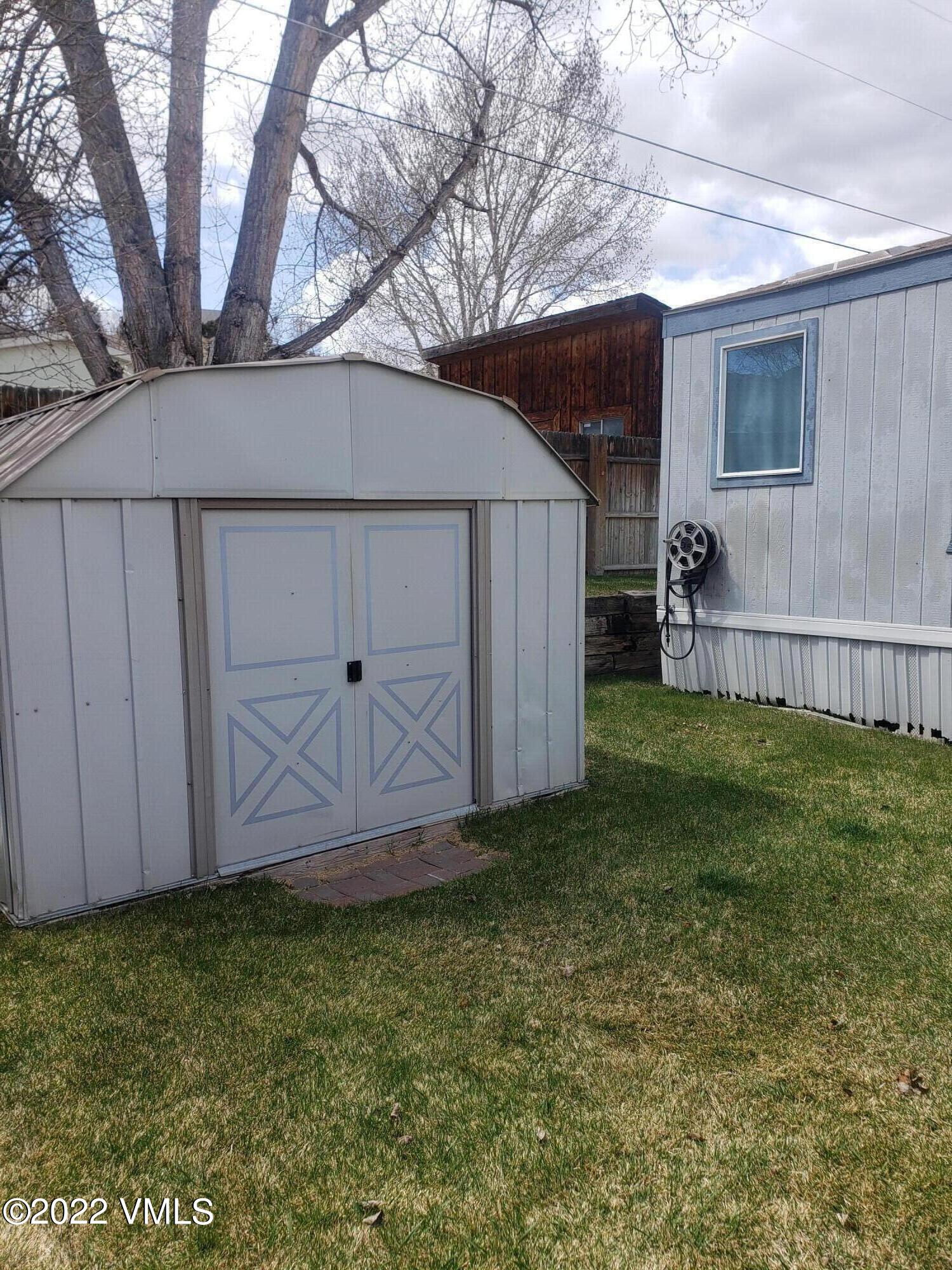 742 2nd Street Gypsum, CO 81637 - Photo 3 of 17 a view of a backyard