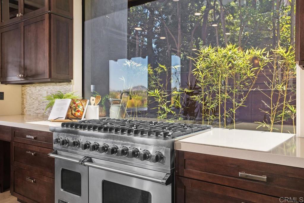 1159 Larksong Lane Encinitas, CA 92024 - Photo 19 of 68 a stove top oven sitting inside of a kitchen