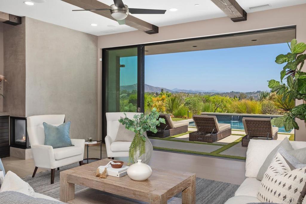 1159 Larksong Lane Encinitas, CA 92024 - Photo 23 of 68 a living room with furniture and a potted plant