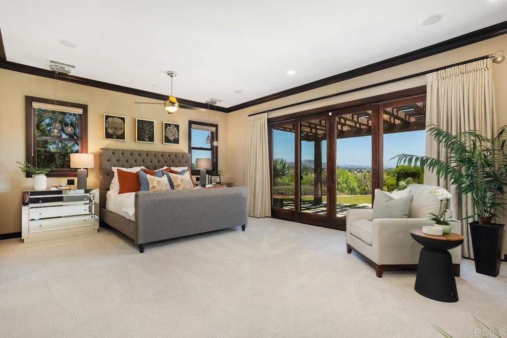 1159 Larksong Lane Encinitas, CA 92024 - Photo 26 of 68 a living room with furniture and a large window