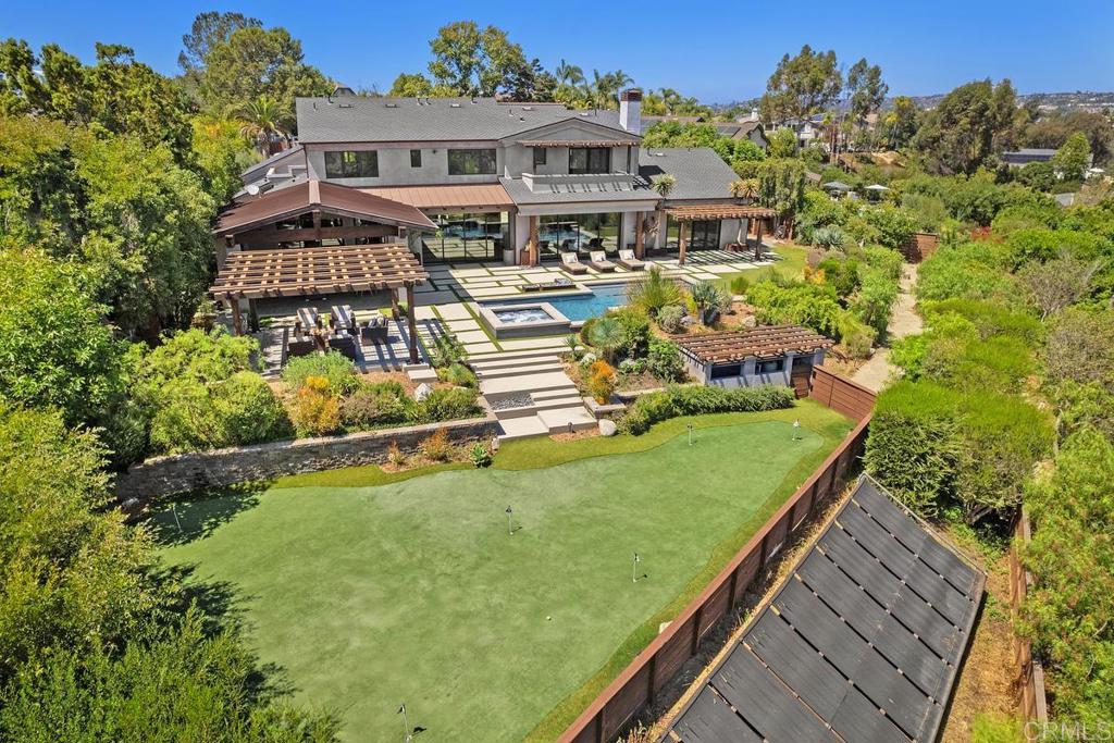 1159 Larksong Lane Encinitas, CA 92024 - Photo 3 of 68 a view of a house with a backyard and sitting area