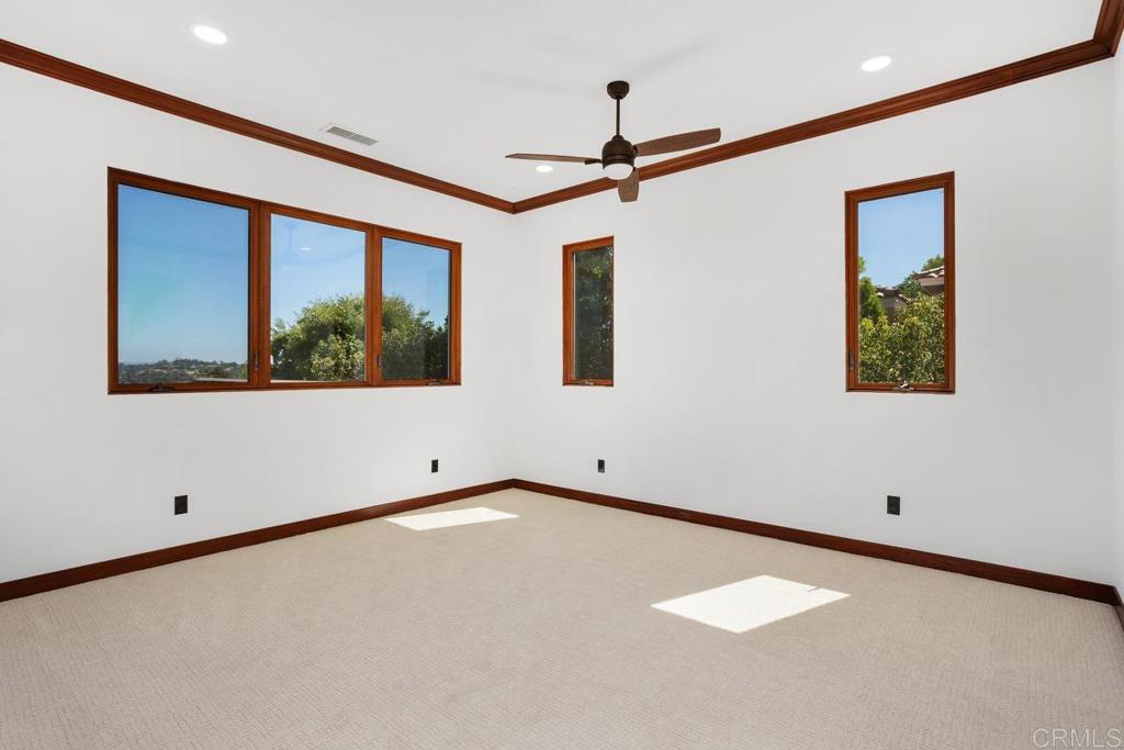 1159 Larksong Lane Encinitas, CA 92024 - Photo 39 of 68 a view of an empty room with a window