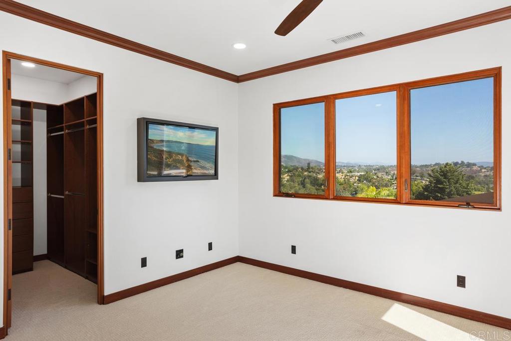 1159 Larksong Lane Encinitas, CA 92024 - Photo 40 of 68 an empty room with windows