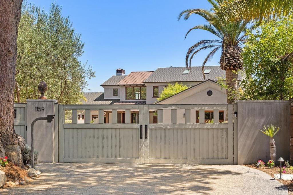 1159 Larksong Lane Encinitas, CA 92024 - Photo 4 of 68 a front view of a house with garden