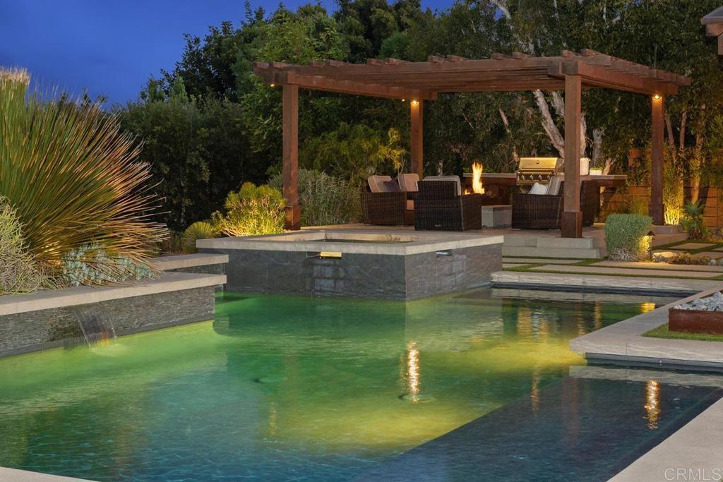 1159 Larksong Lane Encinitas, CA 92024 - Photo 63 of 68 a view of a swimming pool with a patio
