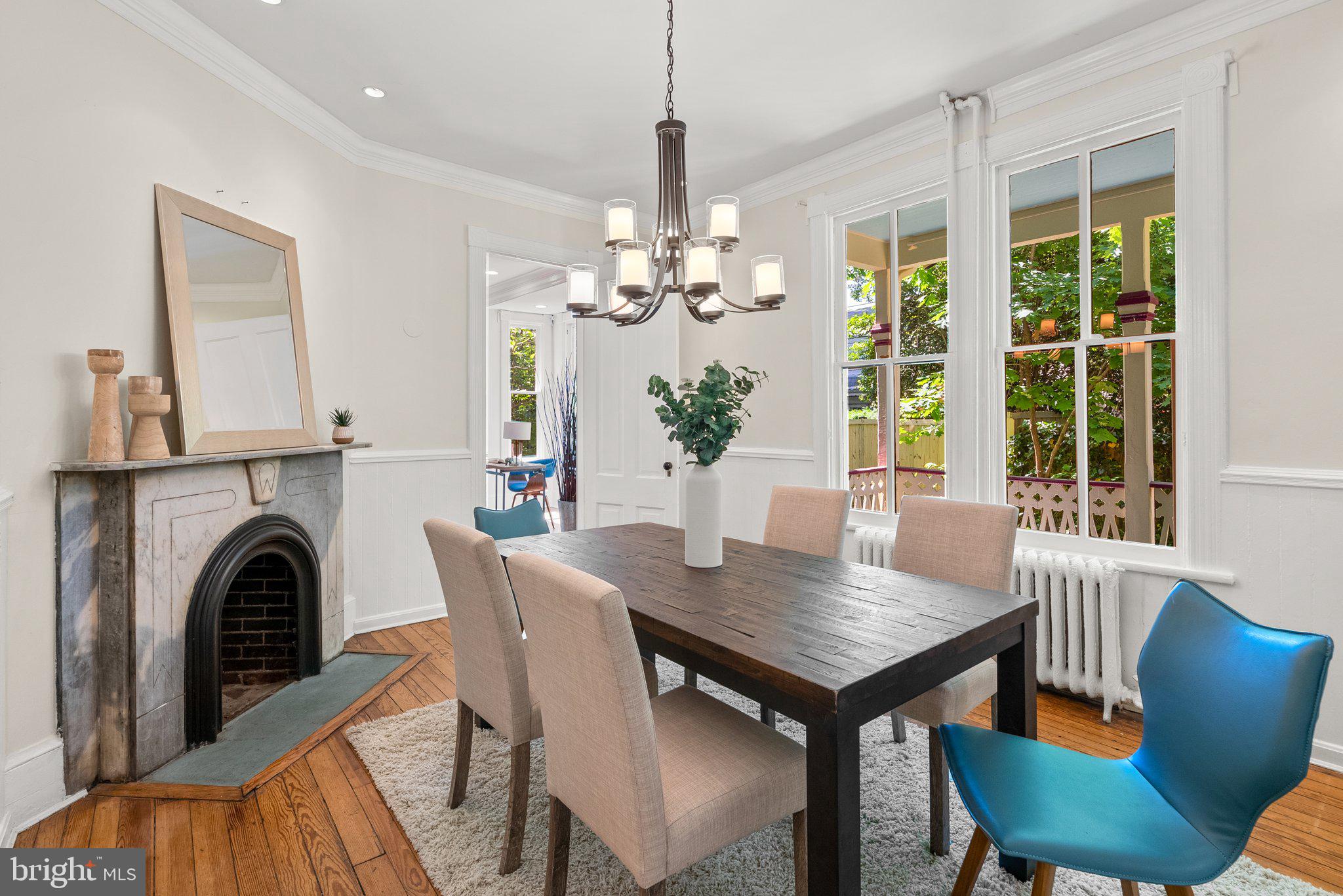 1102 Edgevale Road Silver Spring, MD 20910 - Photo 14 of 47 Dining room with fireplace and hardwood fllors