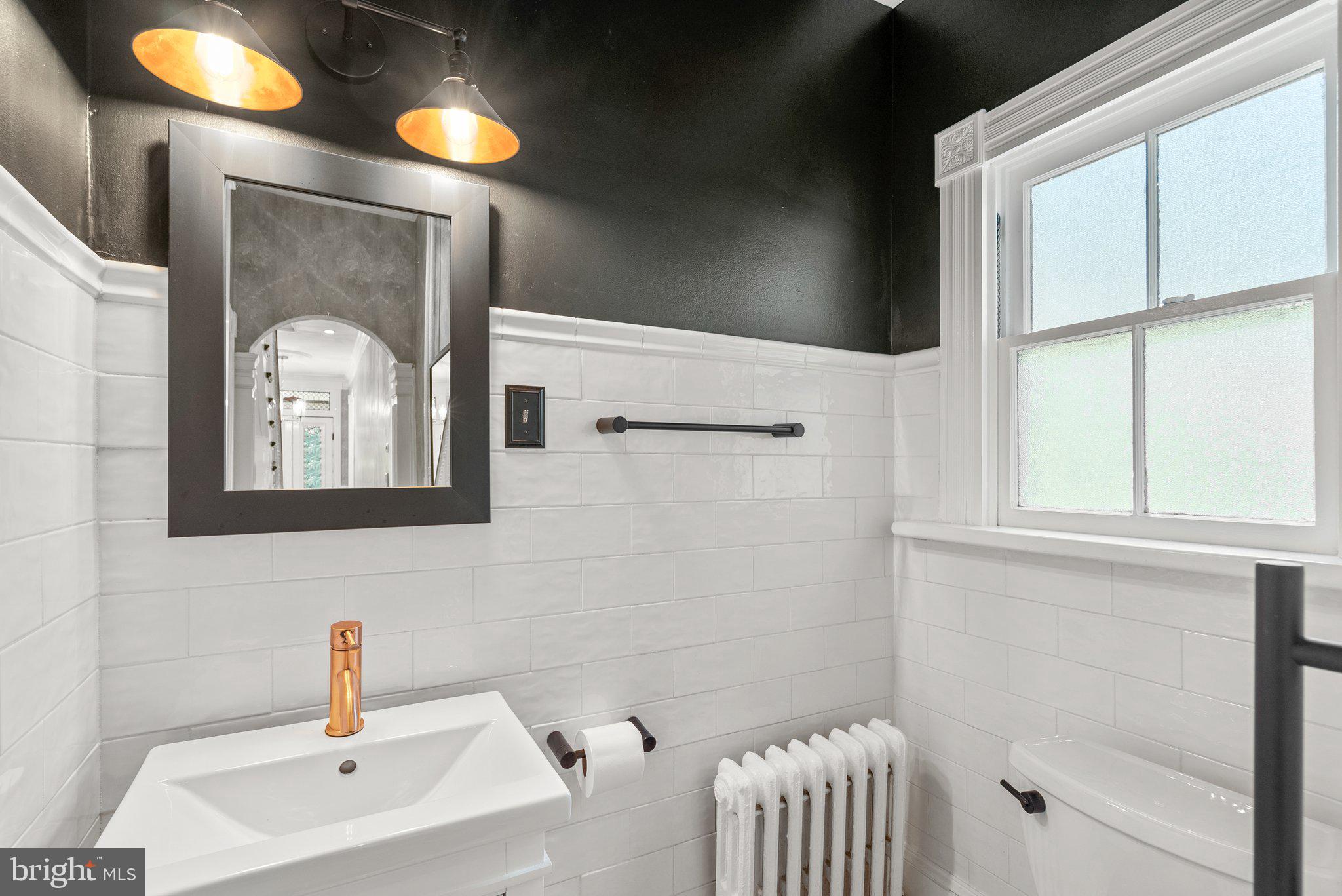 1102 Edgevale Road Silver Spring, MD 20910 - Photo 23 of 47 Renovated Powder room