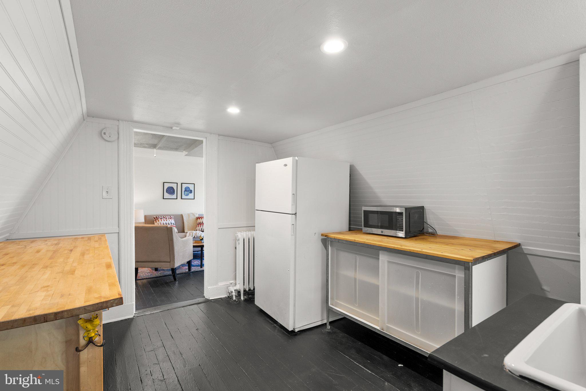 1102 Edgevale Road Silver Spring, MD 20910 - Photo 38 of 47 Refrigerator with wet bar