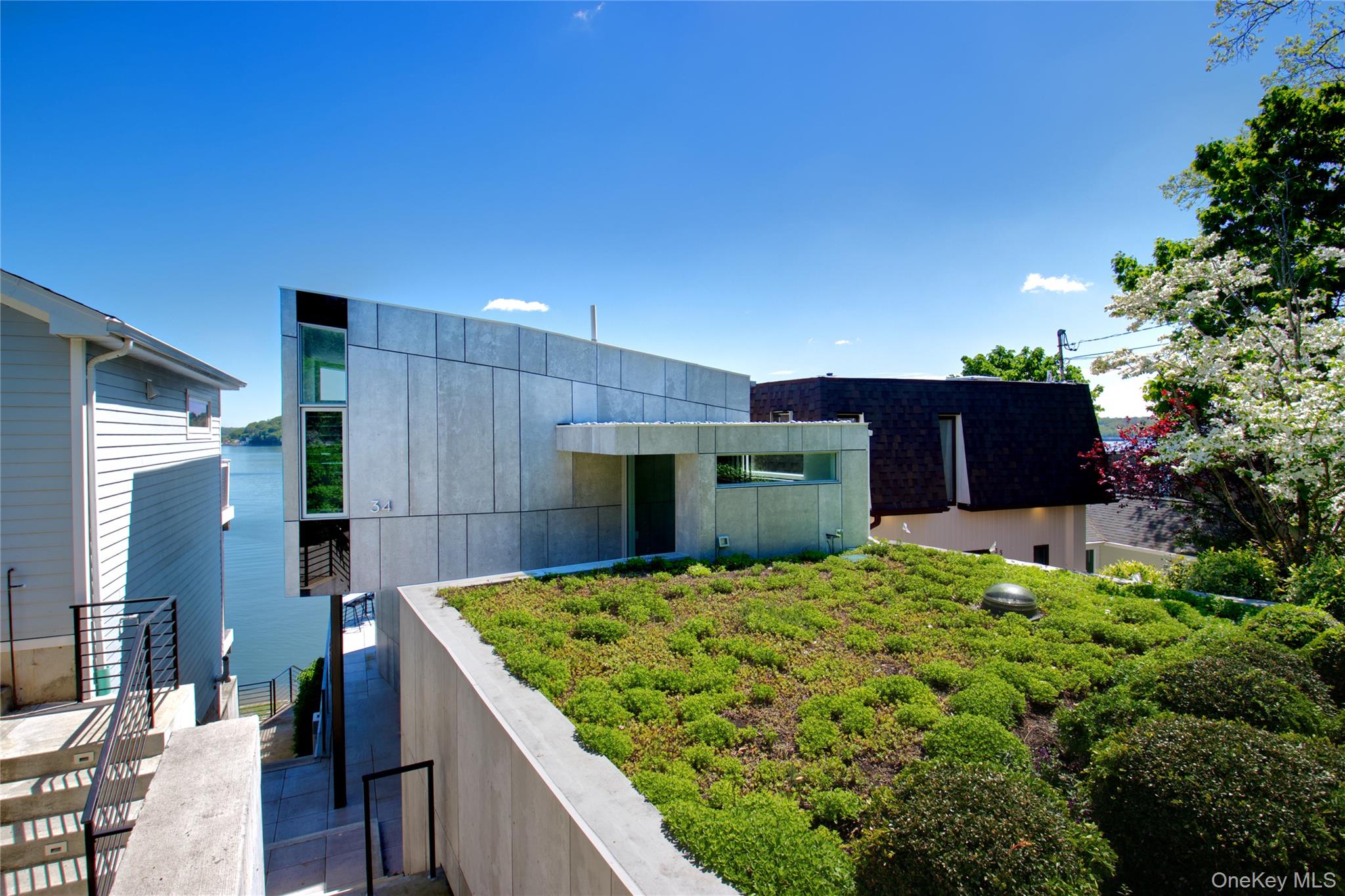 75-34 West Shore Road, Unit 34 Port Washington, NY 11050 - Photo 20 of 22 Front of the house